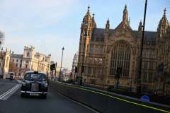 Cabalcade - a 1982 FX4 passes Westminster Abbey